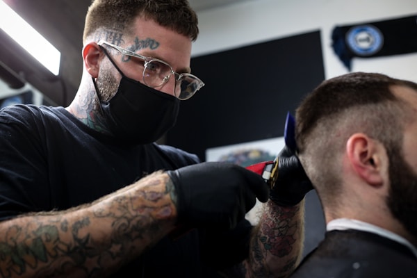 Milwaukee, WI. Businesses trying to getting around post quarantine, offering their services following all the safety measures for customers. Flashy Faded Barbershop was locked for two months.